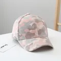 Detailed close-up of pink camo knit baseball cap with thick warm winter fabric texture - Adult Size (Adjustable) / Pink
