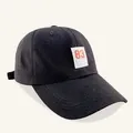 Berretto da baseball in cotone nero con toppa bianca e numero 83 arancione ricamato - Adulto / Nero