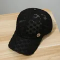 Women's black lace baseball cap with floral mesh texture and gold metallic R logo - Black Rhinestone R Label