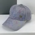 Baseball cap with blue and purple tie-dye mesh fabric and metallic M letter accent - Full Camouflage Gray