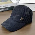 Berretto da baseball in maglia nera con logo M dorato e strass e trama traspirante - Regolabile / Nero