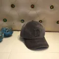 Detailed macro view of the dark grey faux fur baseball cap featuring a shiny rhinestone D logo - Adult Size (56-60cm) / Letter D / Gray