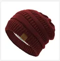 Star knit beanie in burgundy with cozy faux fur lining and Super Star leather patch - Burgundy