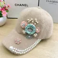 Detail of floral embroidery with pearls and rhinestones on beige plush baseball cap - Pearl Flower Style / Khaki