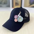 Detail of floral appliques and white deer charm on a black mesh baseball cap - Adult Size (Adjustable) / 3D Floral Deer Decoration (Mesh Cap) / Black Mesh