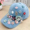 Light blue plush baseball cap featuring 3D floral decorations and sparkling accents - Flower Style / Blue