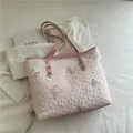 Borsa tote rosa con motivi a rombi, paillettes a farfalla e manici in pelle - Senza Ciondolo / Rosa