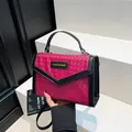 Woven magenta crossbody handbag for women with black trim and elegant gold hardware details - Rose Red