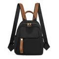 Mochila de tela Oxford negra con ribetes de cuero marrón y herrajes metálicos dorados - Negro