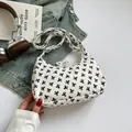Borsa hobo in velluto a coste bianco con stampa a fiocchi neri e tracolla regolabile - Fiocco Nero