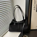 Retro black suede oversized tote bag with metal buckle strap and slim shoulder handles - Black