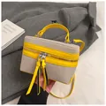 Chic beige tweed box bag featuring bright yellow leather trim and contrast stitching - Yellow