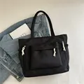 Borsa tote nera di grande capacità con corde intrecciate bianche e tasche multiple - Nero