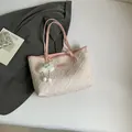 Quilted cream tote bag with pink straps and a cute plush cloud charm detail - With Pendant / Pink