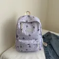 Sac à dos scolaire lavande pour étudiants avec nœuds violets, pois et étiquette mode - Violet