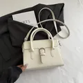 Borsa a tracolla crema minimalista con fibbia argento e manici eleganti - Bianco