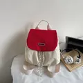 Mochila elegante en crema y rojo con cordón y solapa en contraste para mujer - Burdeos