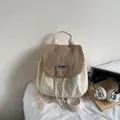 Mochila de lona en contraste beige y marrón con solapa y correas ajustables - Caqui