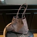 Brown suede tote bag with dual handles and mini coin purse in a vintage style - Brown