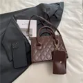 Coffee brown diamond quilted crossbody handbag with matching detachable coin purse charm - Brown