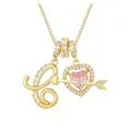 Macro shot of gold letter L pendant with pink heart gemstone and sparkling zircons - Letter C / Gold