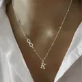 Minimalist silver stainless steel necklace with letter K pendant and infinity symbol detail - Letter A / Silver