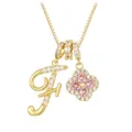 Golden clover necklace with pink zircon and micro-pave letter F pendant on white background - Gold Letter F Style