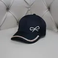 Damen Baseballkappe in Schwarz mit glitzernder Strass-Schleife und Randverzierung - Erwachsenengröße (Verstellbar) / Schwarz