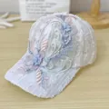 Detailed close-up of white lace baseball cap with floral embroidery and faux pearls - Adult Size (58cm Adjustable) / White