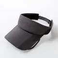 Detail view of dark grey visor with breathable mesh side panels and adjustable strap - Adult Size (Adjustable) / Dark Gray