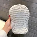 Detailed close-up of white baseball cap with hand-applied pearls and shiny rhinestones - Adult Size (Adjustable) / White AB Iridescent Pearl