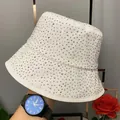 Sparkling white cotton bucket hat with crystal rhinestones for a glamorous fashion look - M (56-58cm) / White