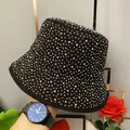 Close-up detail of colorful rhinestones on a black cotton bucket hat with wide brim - M (56-58cm) / Black AB Color Rhinestones
