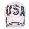 Close-up of sparkling USA rhinestone lettering on white cotton baseball cap with rhinestones - White