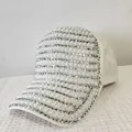 White baseball cap featuring elegant faux pearls and sparkling rhinestone stripes - Adult Size (Adjustable) / White