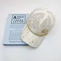 Elegant ivory lace baseball cap for women with rhinestone chain and crystal bow detail - Off White