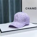 Close-up of purple baseball cap with white floral embroidery and sparkling rhinestones - Adult, Adjustable / Purple