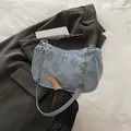 Light blue crossbody bag with floral texture and silver chain strap for women - Blue