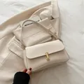 Minimalist cream white leather underarm bag with gold U-shaped buckle for women - White