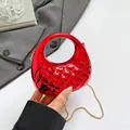 Glossy red quilted handbag with hollow round handle and gold chain strap - Red
