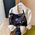 Sac à main rétro en toile noire avec motifs floraux et poignées en perles de bois - Noir