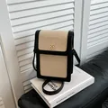 Mini sac bandoulière contrasté en beige et noir avec fermoir trèfle doré élégant - Noir sans Pendentif