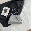 Silver woven cloud crossbody bag with pleated texture and thin shoulder strap - Silver