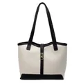 Bolso tote en blanco crema con ribetes de cuero negro y cierre dorado elegante - Beige/Negro