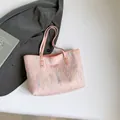 Pink quilted tote bag with colorful wavy stitching and metal logo plaque on the front - Pink Without Pendant