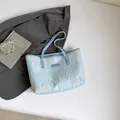 Light blue large tote bag with embossed E pattern and colorful wavy embroidery - Blue Without Charm