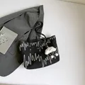 Large black textured tote bag with colorful wave embroidery and white cloud pendant - Black With Pendant