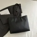 Elegant black minimalist faux leather tote bag with long shoulder straps for daily commute - No Pendant / Black