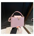 Pink sequin handbag with metallic V-buckle and elegant chain shoulder strap - Pink