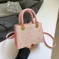 Pink crossbody bag with floral embroidery and woven handle for women fashion - Pink